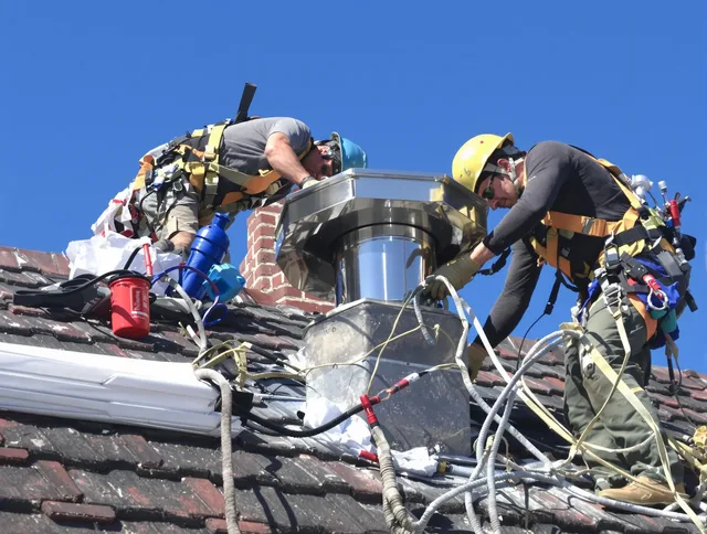Protective chimney cap installed by Lynnfield Chimney Sweep in Lynnfield, MA