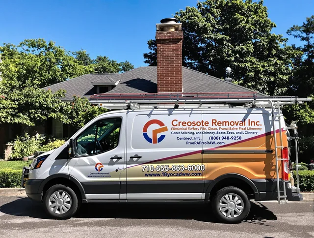 Lynnfield Chimney Sweep technician removing creosote safely in Lynnfield, MA