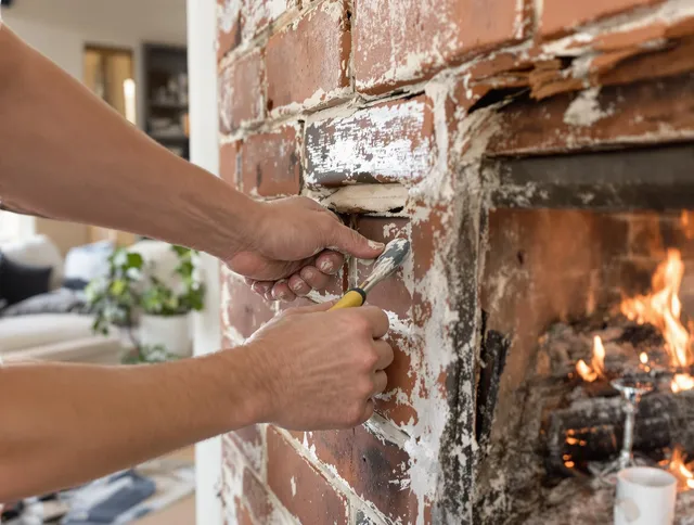 Routine fireplace repair by Lynnfield Chimney Sweep in Lynnfield, MA